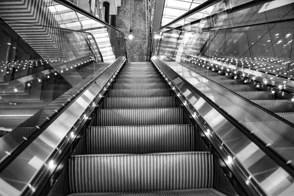 Close up of Escalator going up in black and white